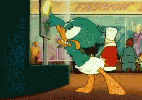 Baby Plucky Duck from "Tiny Toon Adventures" mashing the elevator buttons. 