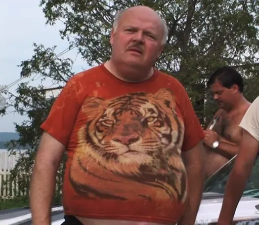 Philedelphia Collins from Trailer Park Boys wearing his Mustard Tiger shirt looking kinda perplexed tbh